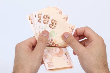 Türkiye beyaz arka planda bir avuç kağıt para