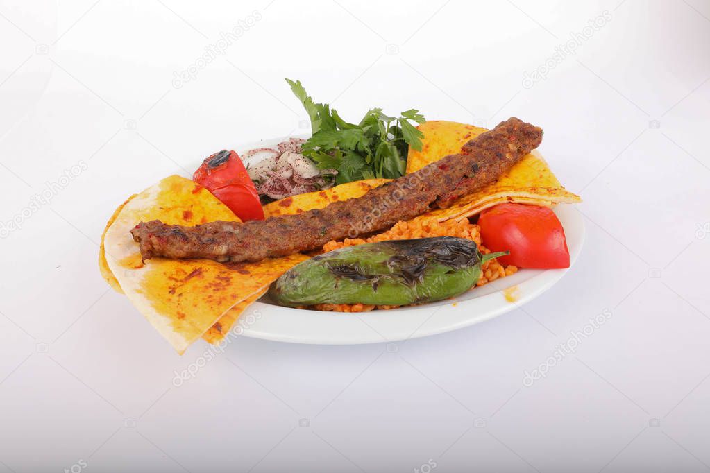 Turkish Adana Kebab with Vegetables on the Plate
