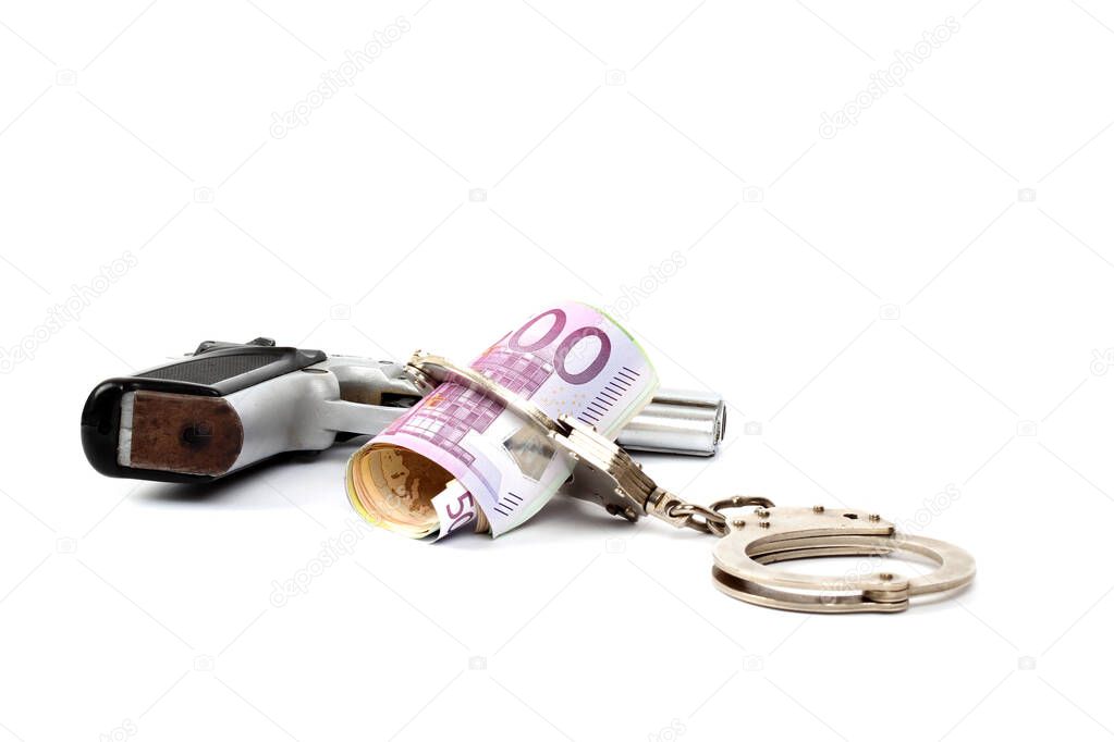 Money and handcuffs. Concept for corruption, fraud, money laundry