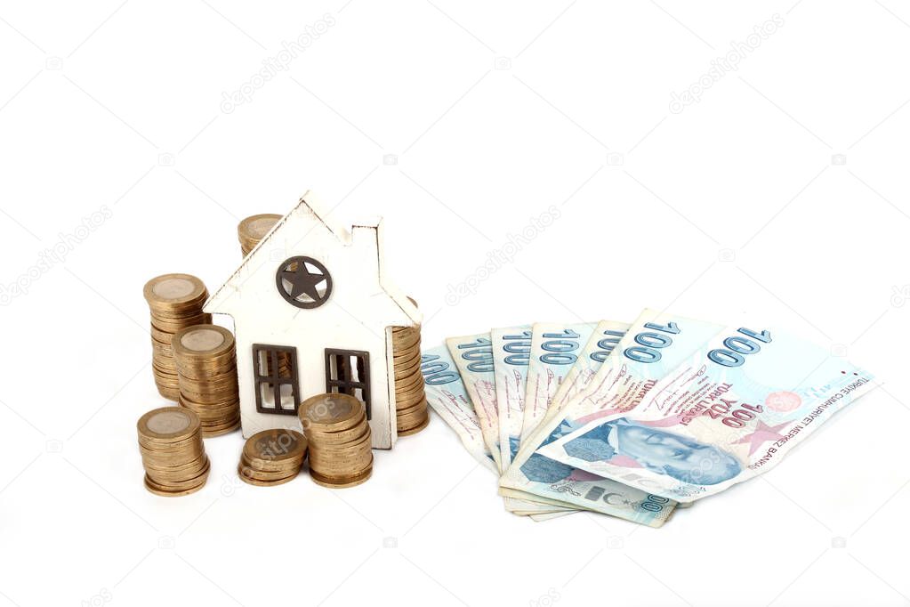 House on money pillars suggesting property investment