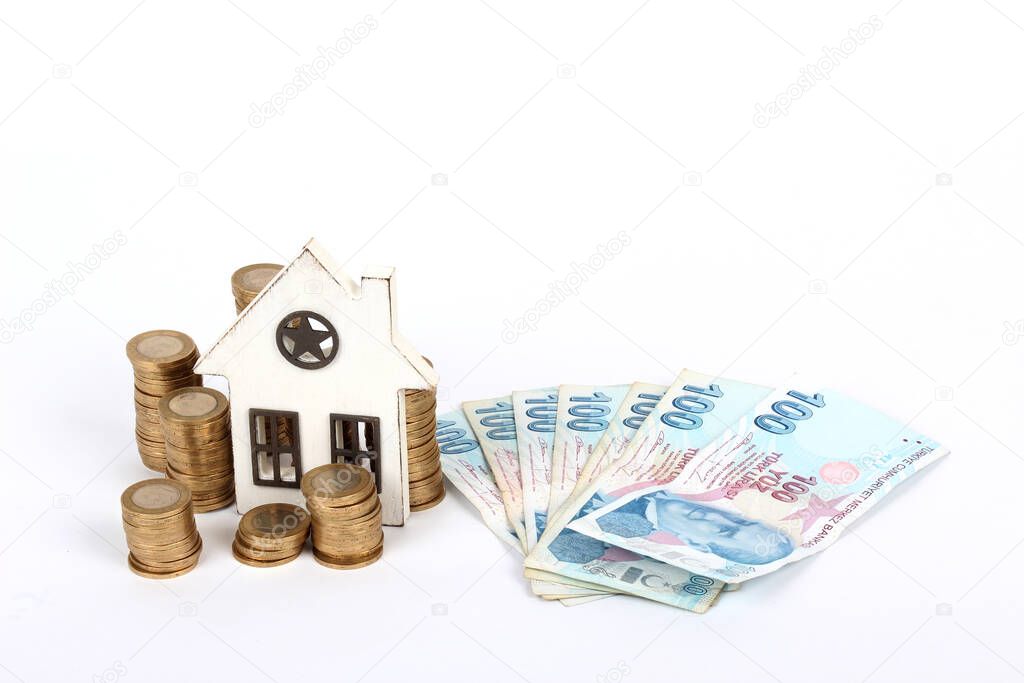 House on money pillars suggesting property investment