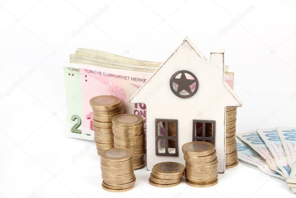 House on money pillars suggesting property investment