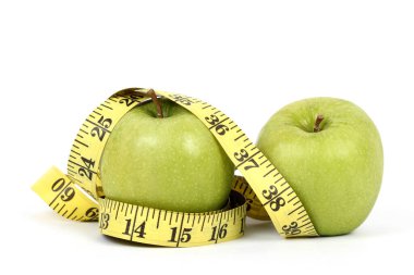 Beyaz zeminde kırmızı ve yeşil elma diyeti   