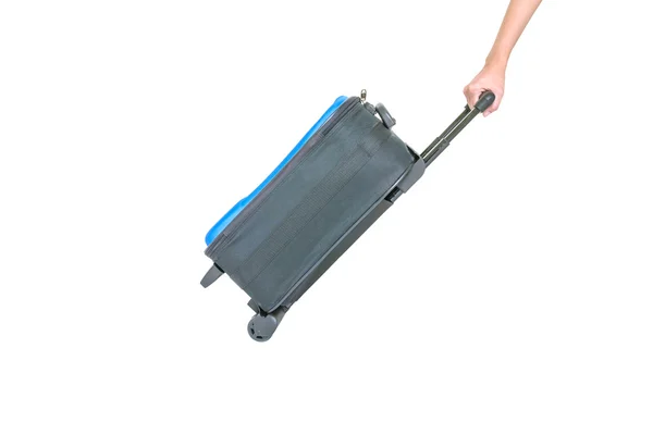 Close-up vrouw hand slepen blauwe Bagage geïsoleerd op witte achtergrond, stof bagage met kunststof roller voor reis concept — Stockfoto