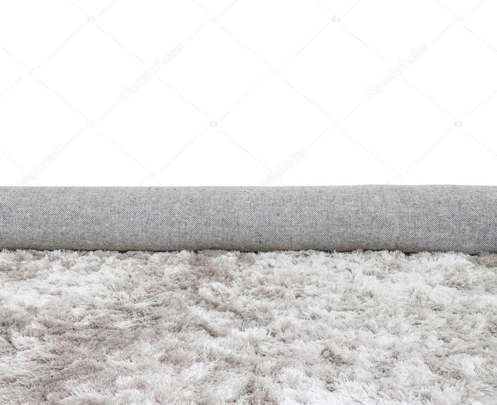 Closeup surface abstract fabric pattern at the roll gray fabric carpet at the floor of house texture background isolated on white background