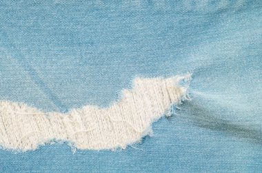 Closeup yüzeyi eski mavi jean pantolon kumaş doku arka plan