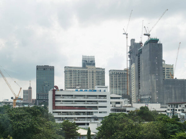 Aerial crane construction tower and sky view of Bangkok city thailand