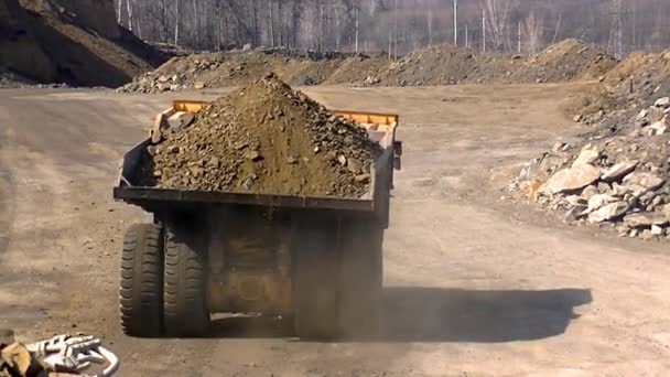 Hydraulic Excavator Loads Blasted Rock Belaz — Stock Video