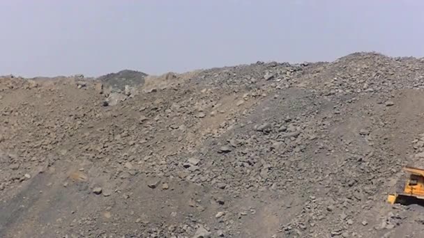 Coal producer. a huge dump truck is moving along the technological road — Stock Footage Coal Producer Huge Dump Truck Moving Technological Road Royalty Free Stock Footage