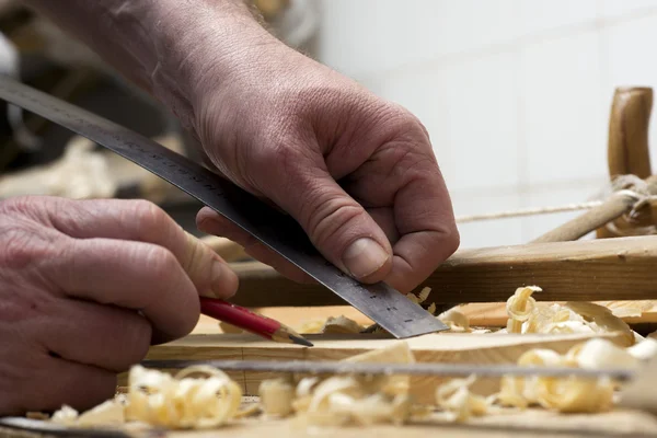 Carpenter working,hammer,meter and screw-driver on construction Stock Image