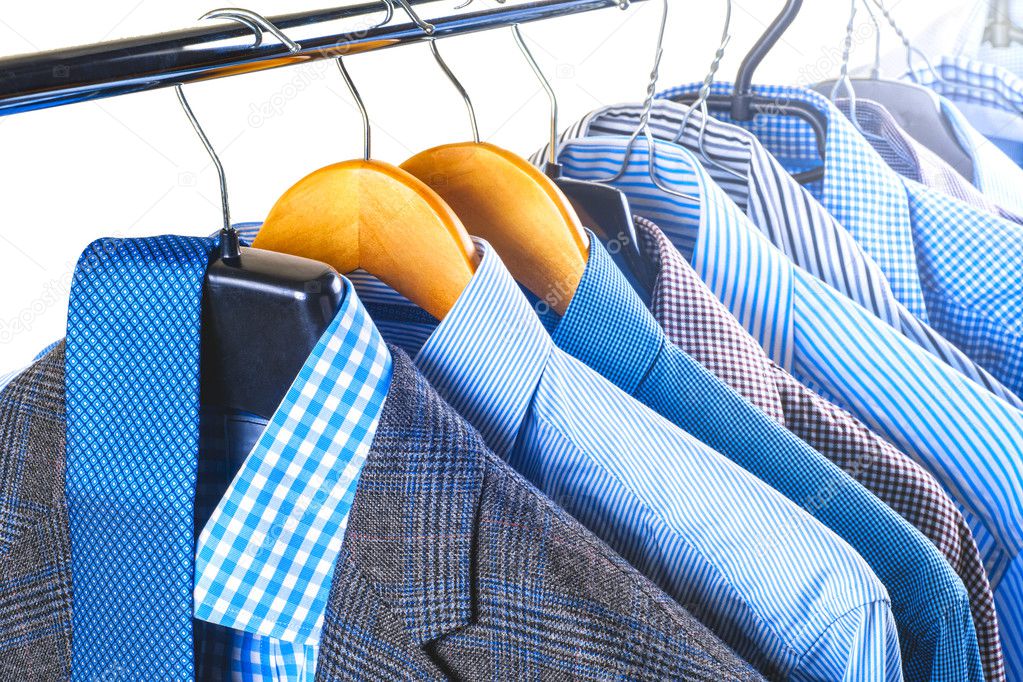 shirts on hangers. mens suit