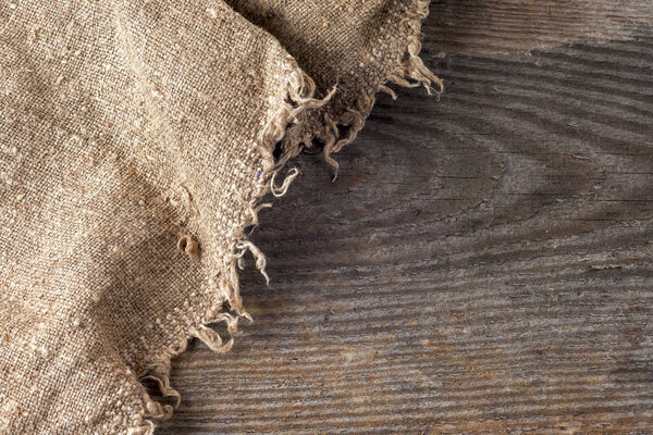 burlap hessian sacking on wooden background