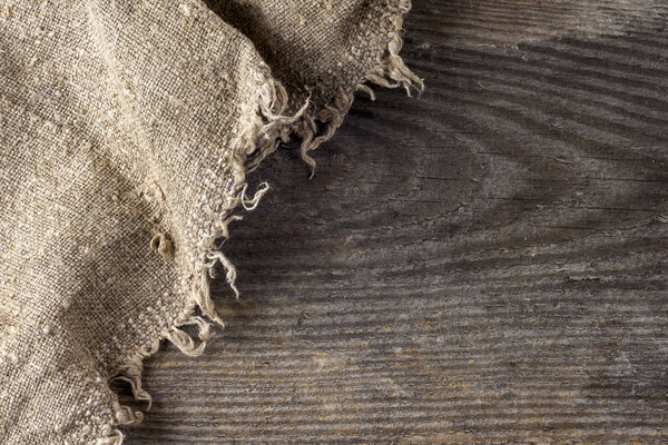 burlap hessian sacking on wooden background
