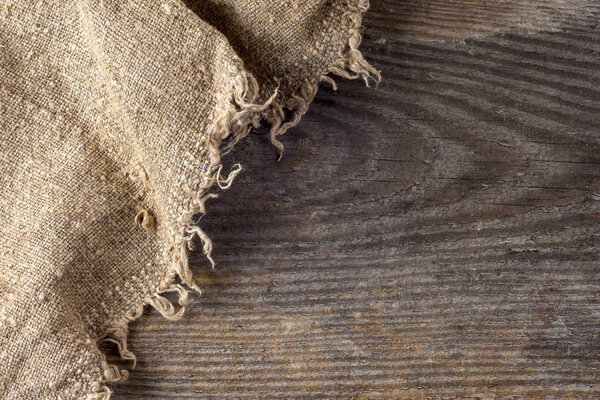 burlap hessian sacking on wooden background