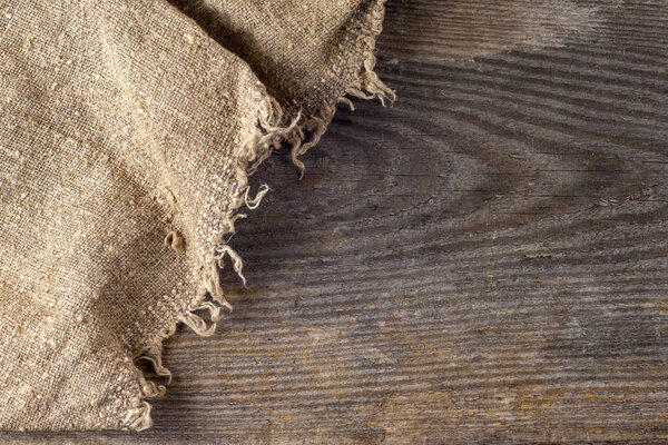 burlap hessian sacking on wooden background