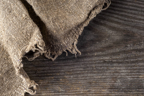 burlap hessian sacking on wooden background