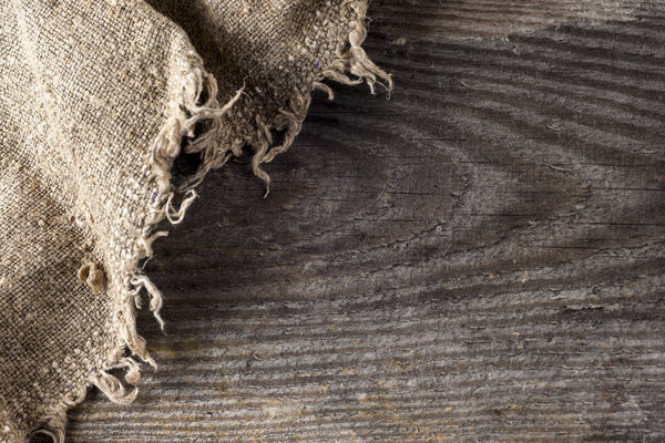 burlap hessian sacking on wooden background