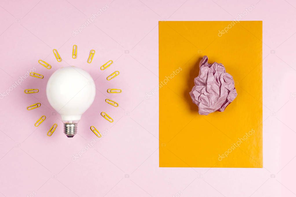 great idea concept with crumpled colorful paper and light bulb o