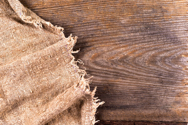 burlap hessian sacking on wooden background