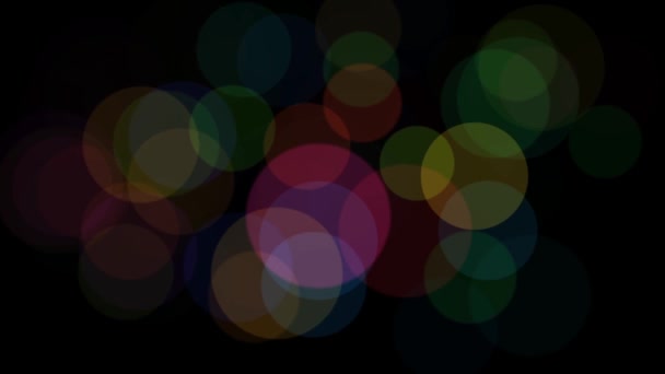 Lumières ambiantes Bokeh colorées sur fond noir 