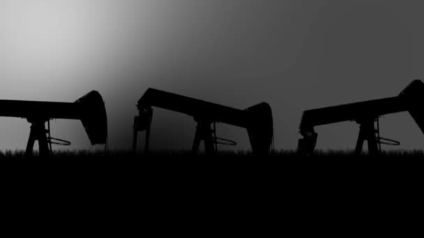 Silhouette of Oil Pumps in a Grim Sad Look Pumping Oil from the Ground — Stock Video