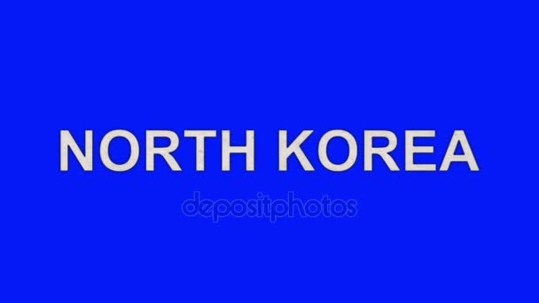 Las palabras de Corea del Norte ardiendo en llamas hasta las cenizas en un fondo de pantalla azul — Vídeos de Stock