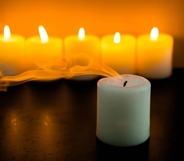 Burning yellow candles — Stock Photo, Image