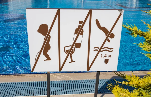Signboard with cautions near Pool — Stock Photo, Image