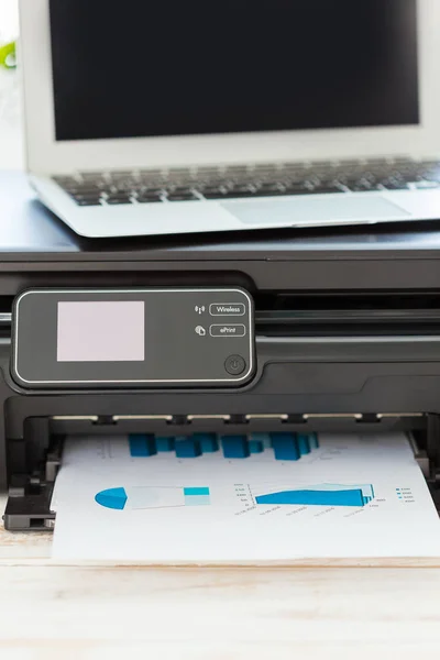 Printer and computer on the desk