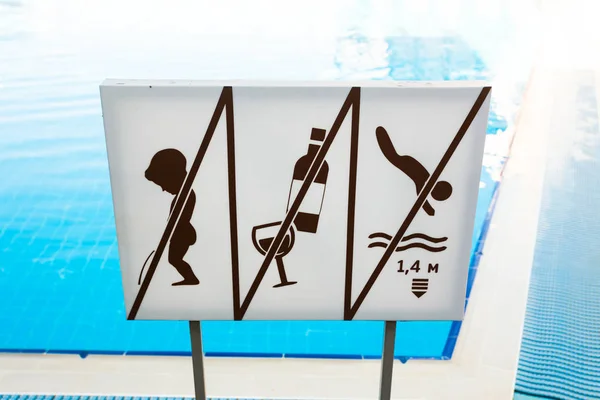 Signboard with cautions near Pool — Stock Photo, Image