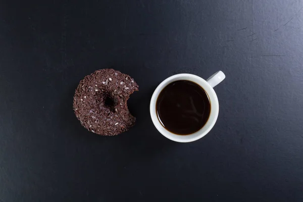 Rosquilla y taza de café —  Fotos de Stock