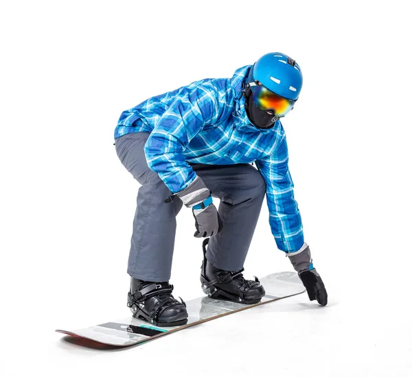 Mann in Sportbekleidung mit Snowboard — Stockfoto