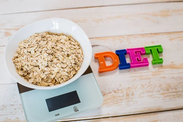 Bowl of porridge on scales