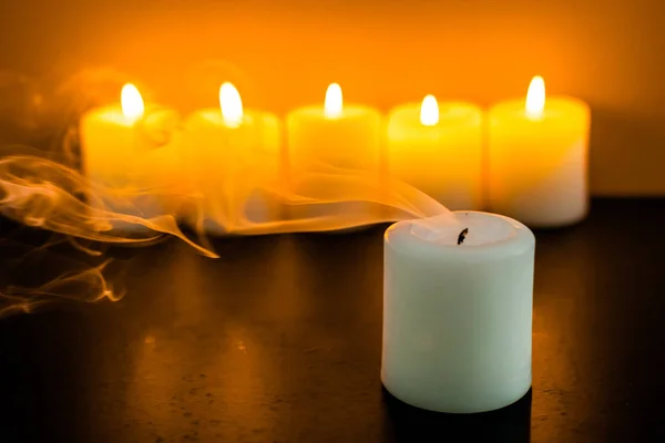 Burning yellow candles — Stock Photo, Image