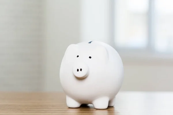 Piggy bank on table — Stock Photo, Image