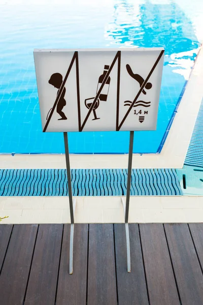 Signboard with cautions near Pool — Stock Photo, Image