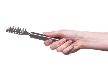 Mutfak eşyaları tutan kadın