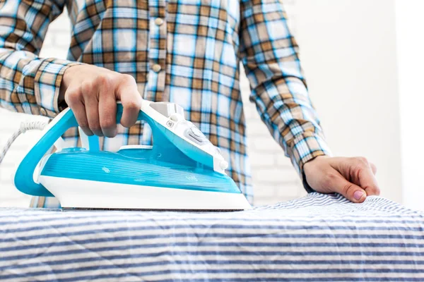 How to Dry Clothes With an Iron