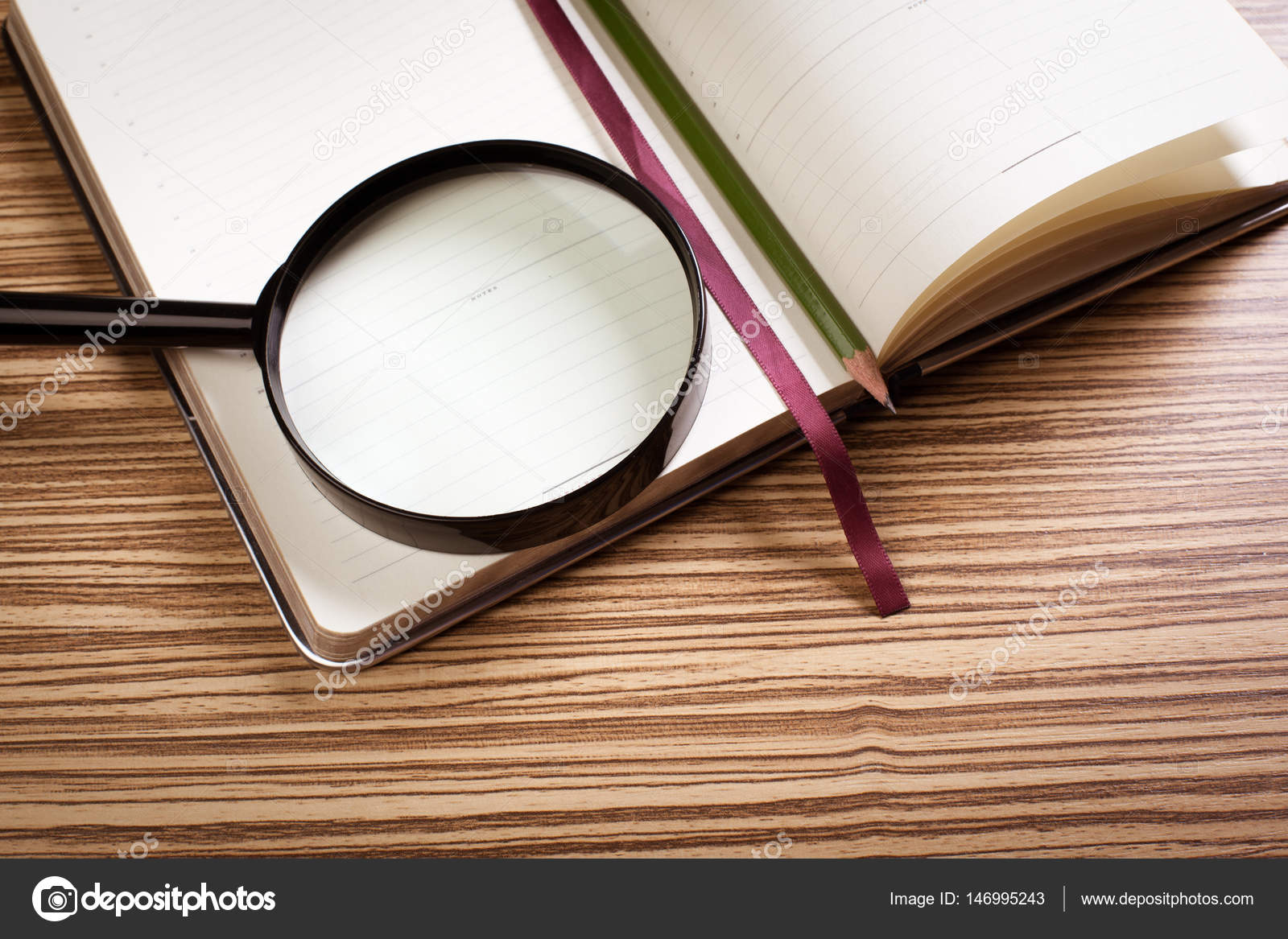 Magnifying glass and book — Stock Photo © Fotofabrika #146995243