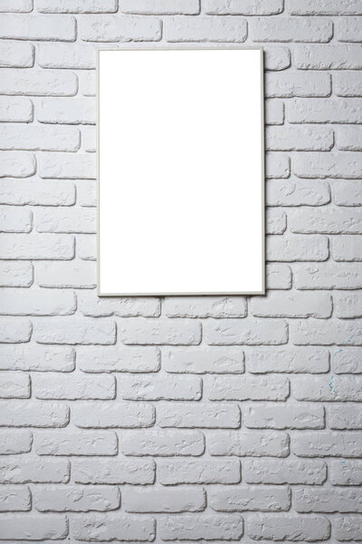 Blank black picture frame on the wall