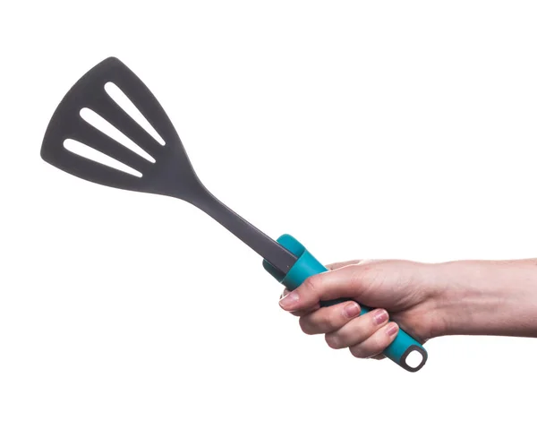 Woman holding kitchen utensils — Stock Photo, Image