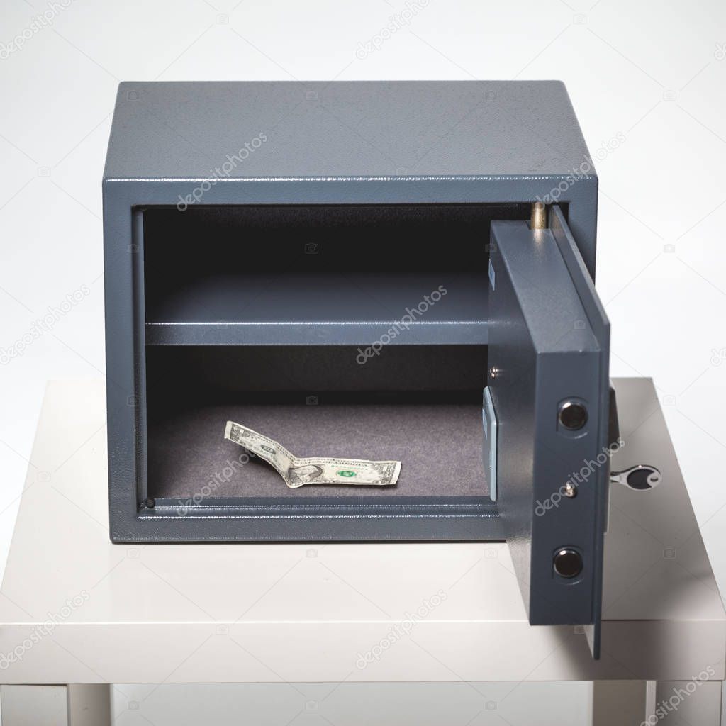 small grey Safe with money