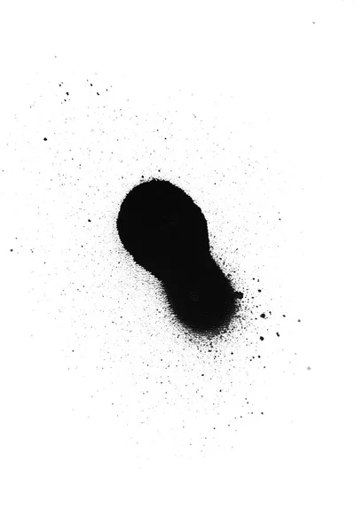 Black color spray paint on a white background paper — Stock Photo, Image