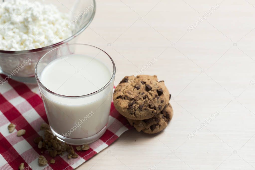 Glass of milk on table