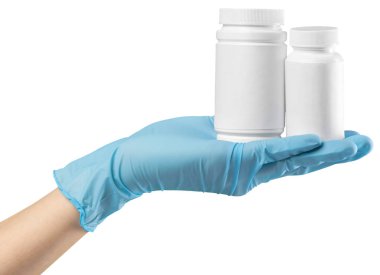 Bir ilaç ile eldivenli elini