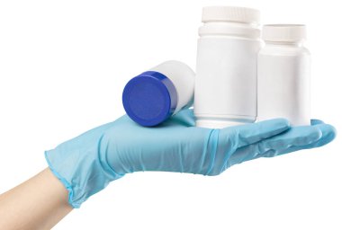Bir ilaç ile eldivenli elini