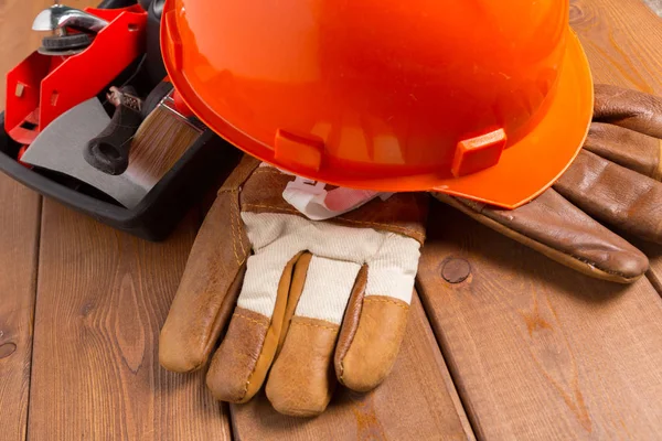 Work protection concept on wooden table, top view