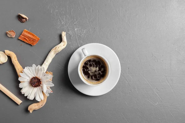 coffee and flower on table, top view.
