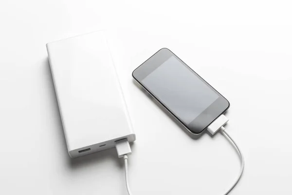 Smartphone Charging Power Bank Table Background — Stock Photo, Image