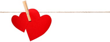 Kalpler karton üzerinde clothespin iple üzerinden 